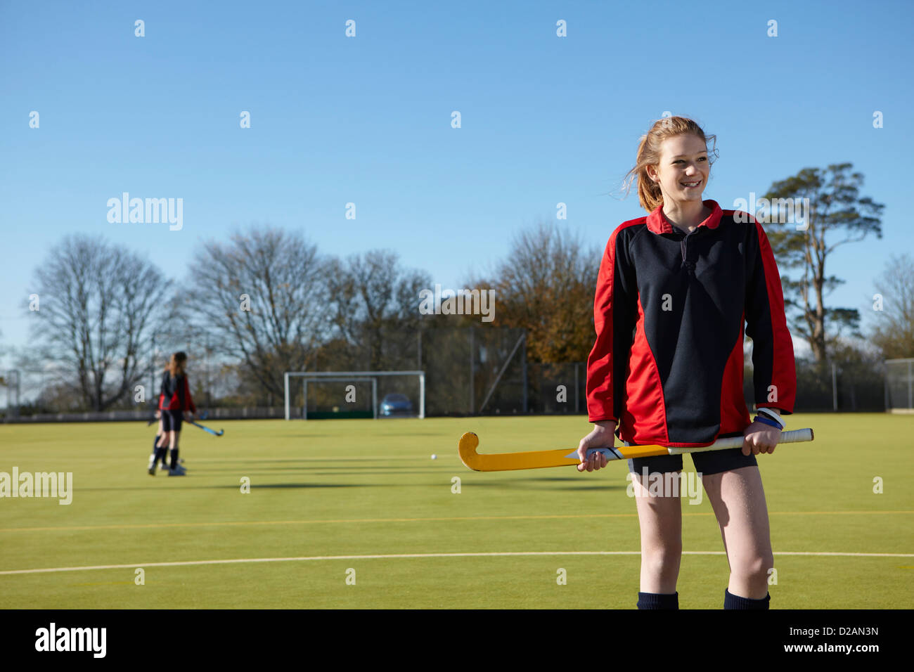 Lacrosse player in piedi in campo Foto Stock