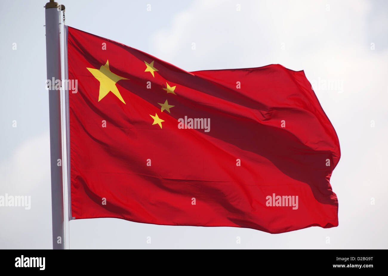 Hong Kong, Cina, Repubblica Popolare Cinese bandiera nazionale sventolare nel vento Foto Stock