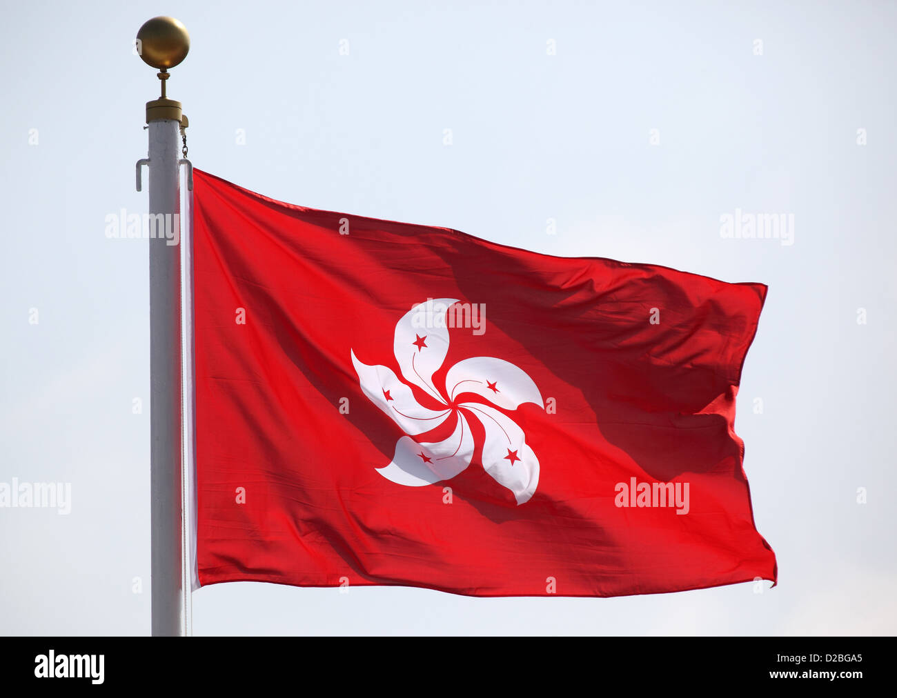 Hong Kong, Cina, Hong Kong bandiera sventolare nel vento Foto Stock