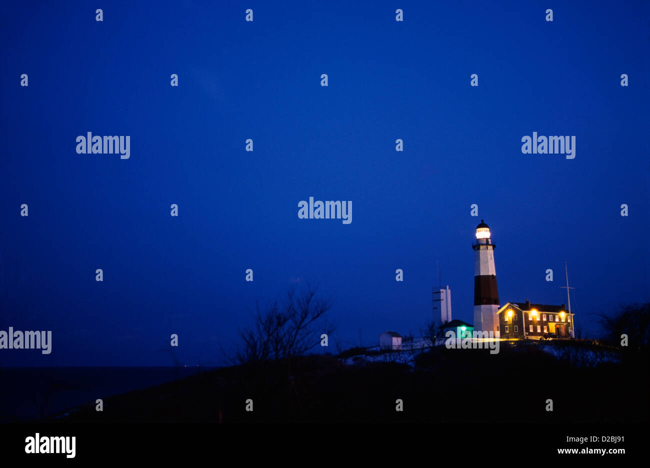 New York, Long Island, Montauk Point. Faro in prima serata. Foto Stock