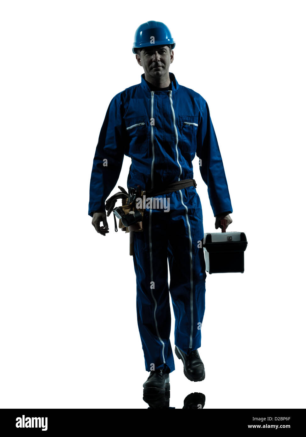 Un aggiustatore lavoratore silhouette in studio su sfondo bianco Foto Stock