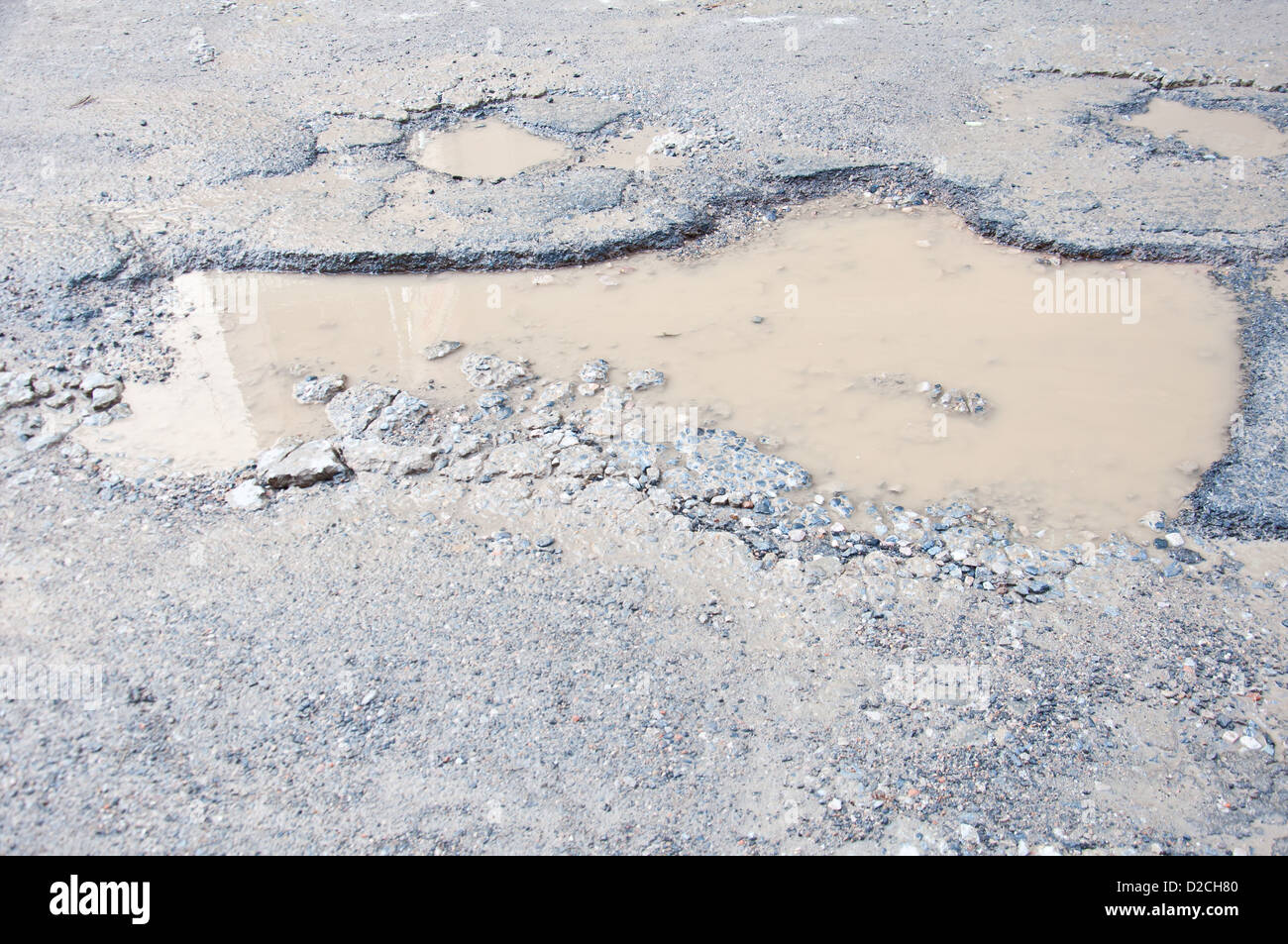 Strada rotto e l'acqua Foto Stock