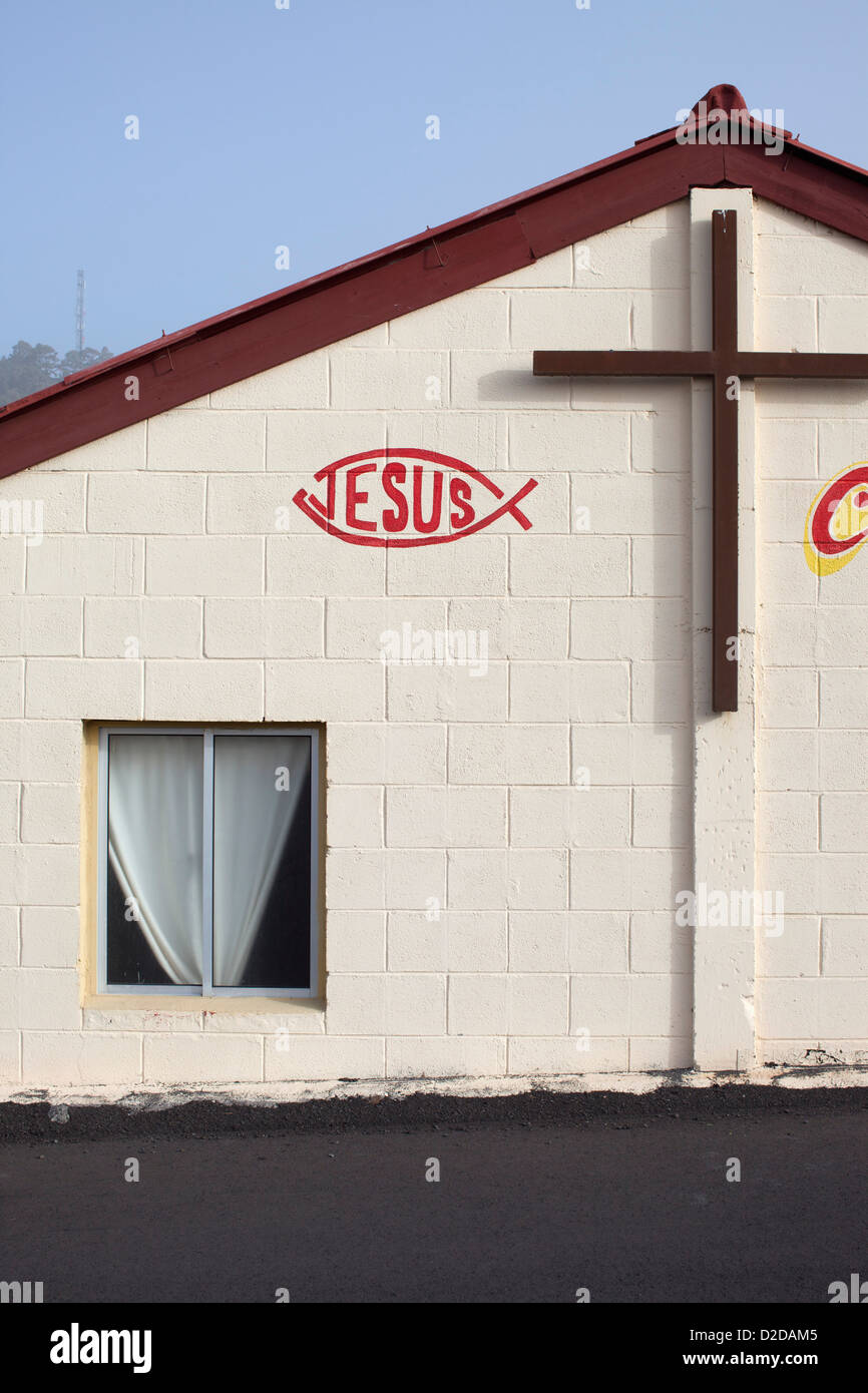 Il cristiano simbolo di pesce con Gesù scritto in sulla parete di una chiesa Foto Stock