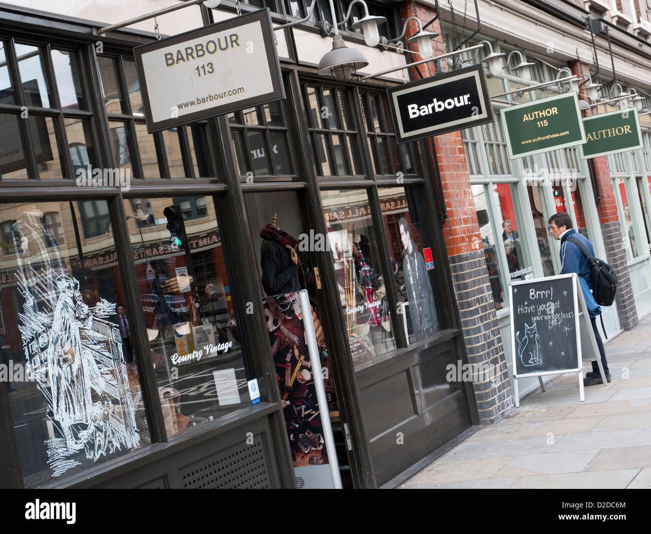 Fila di negozi in Spitalfields Market, East London Foto Stock