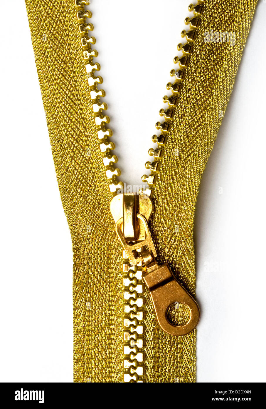 Rimosse gold zipper isolato su bianco, alta risoluzione Foto Stock
