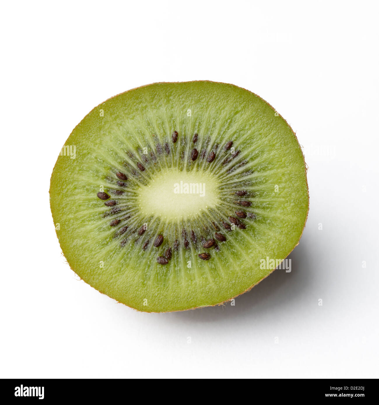 I kiwi, Actinidia deliciosoa, affettato aperto che mostra i semi Foto Stock