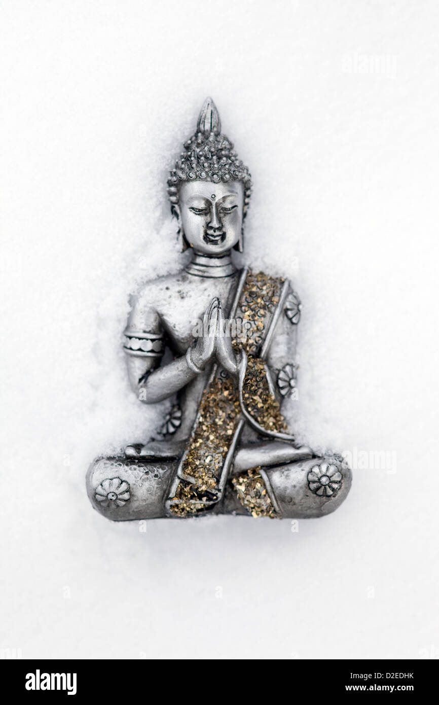 Argento Thai statua del Buddha nella neve Foto Stock