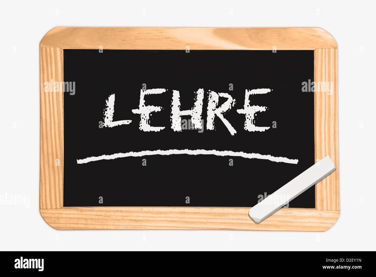 Dettaglio foto di una lavagna con il tedesco iscrizione apprendistato, bianco gesso si trova in un angolo Foto Stock