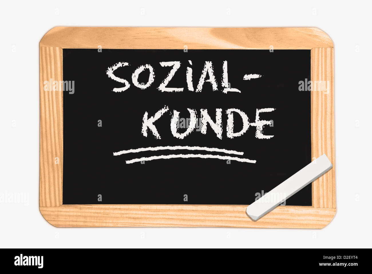 Dettaglio foto di una lavagna con il tedesco iscrizione studi sociali, bianco gesso si trova in un angolo Foto Stock