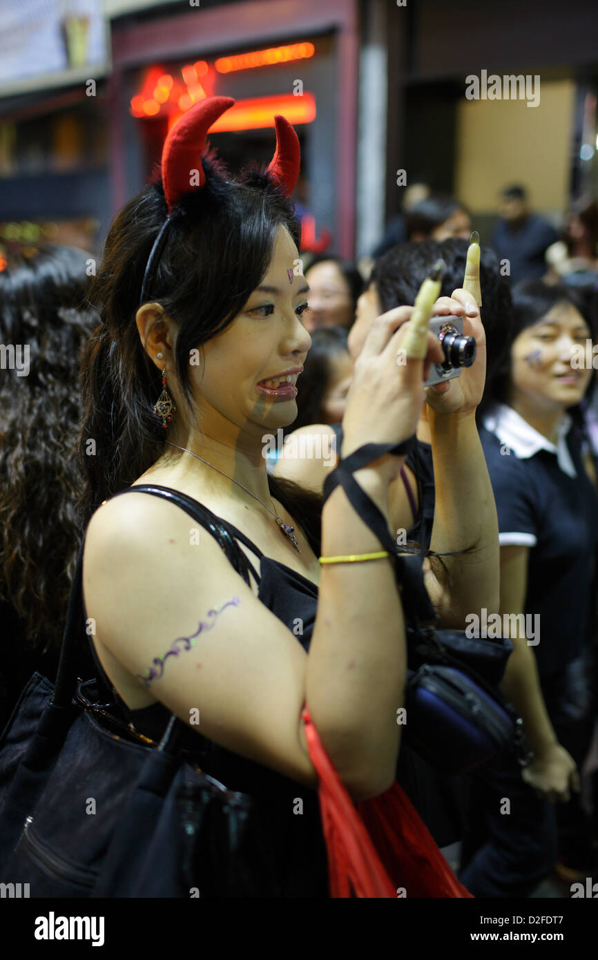 Hong Kong, Cina, una donna in disguise fotografato Foto Stock
