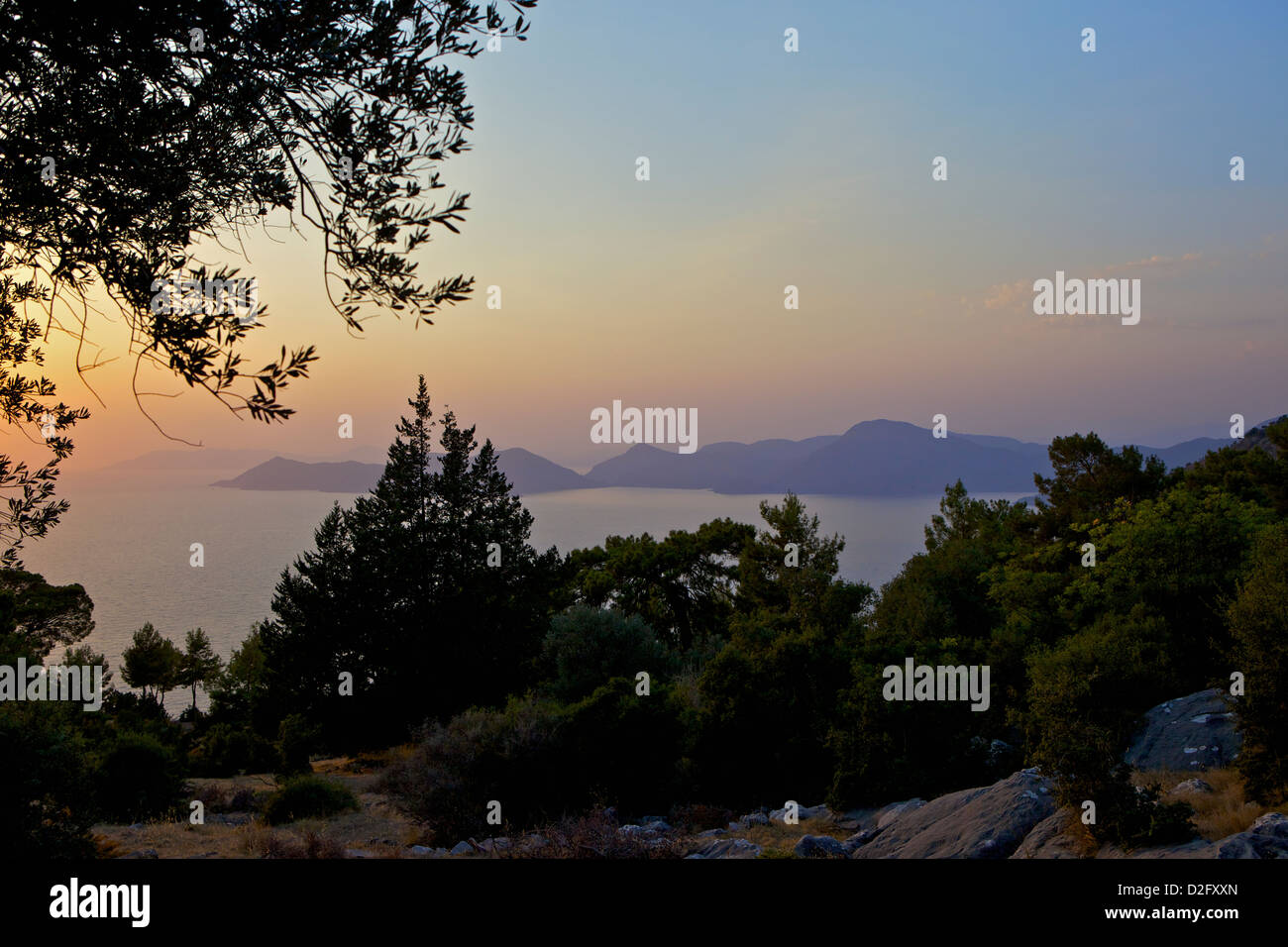 Via Licia al tramonto vicino Fethiye, Oludeniz, Mediterraneo, Turchia, Foto Stock