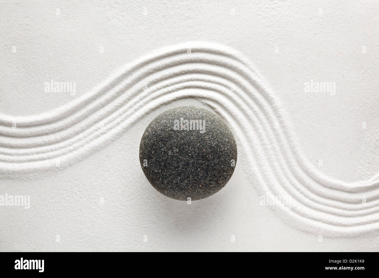Zen Stone in sabbia Foto Stock