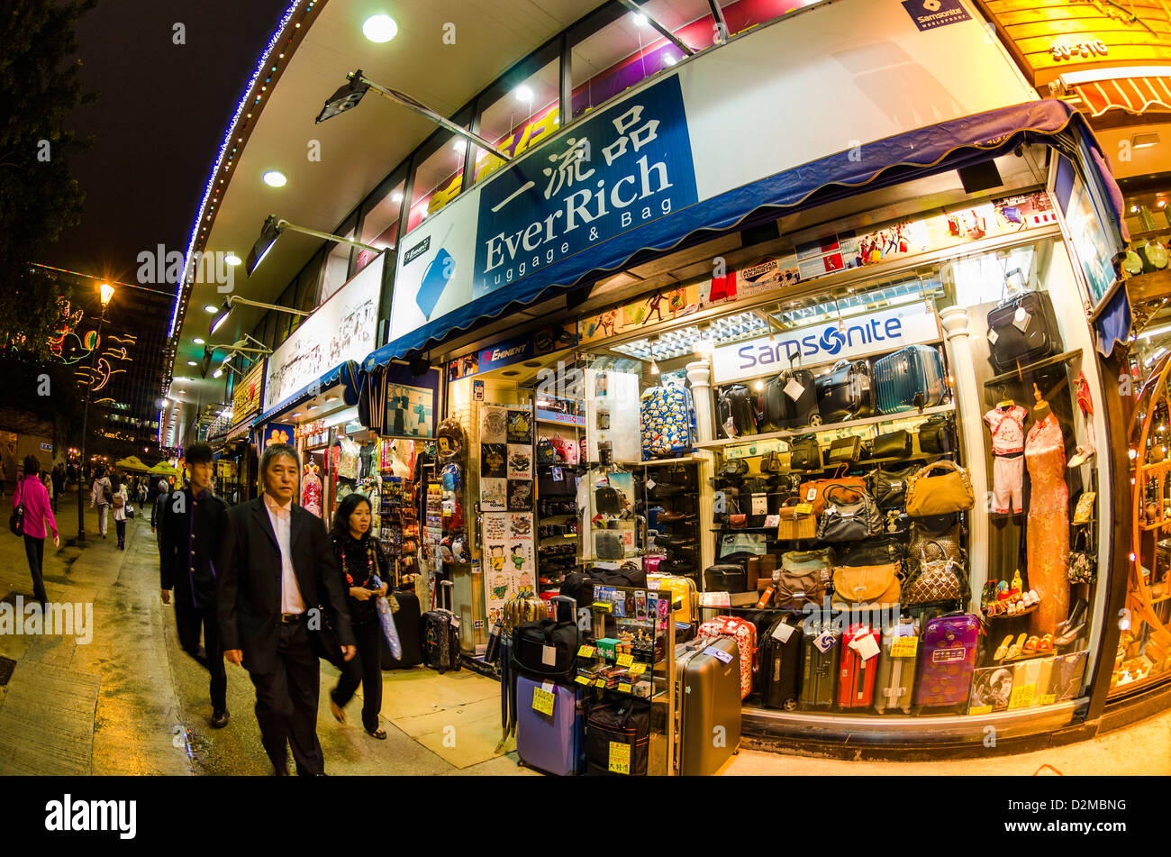 Aperto 24 ore - La strada dello shopping di Hong Kong di notte Foto Stock