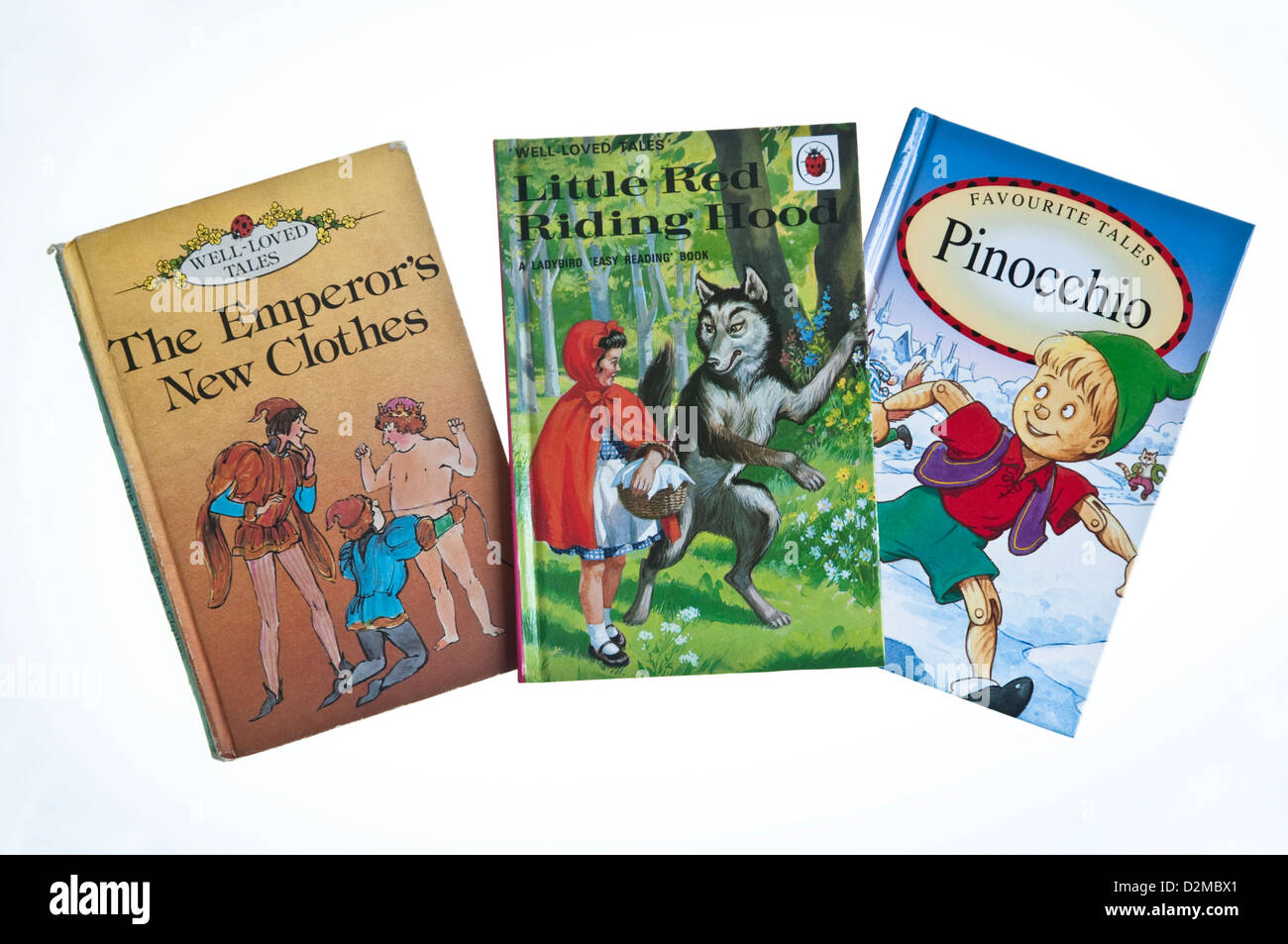 Tre fiaba tradizionale racconti pubblicati da coccinella libri; i vestiti nuovi dell'Imperatore, Little Red Riding Hood & Pinocchio. Foto Stock