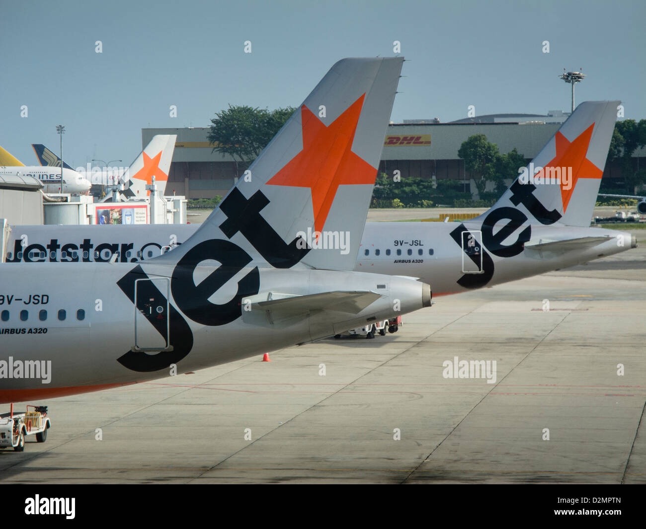 Jetstar piani su l'Aeroporto Changi di Singapore. Foto Stock