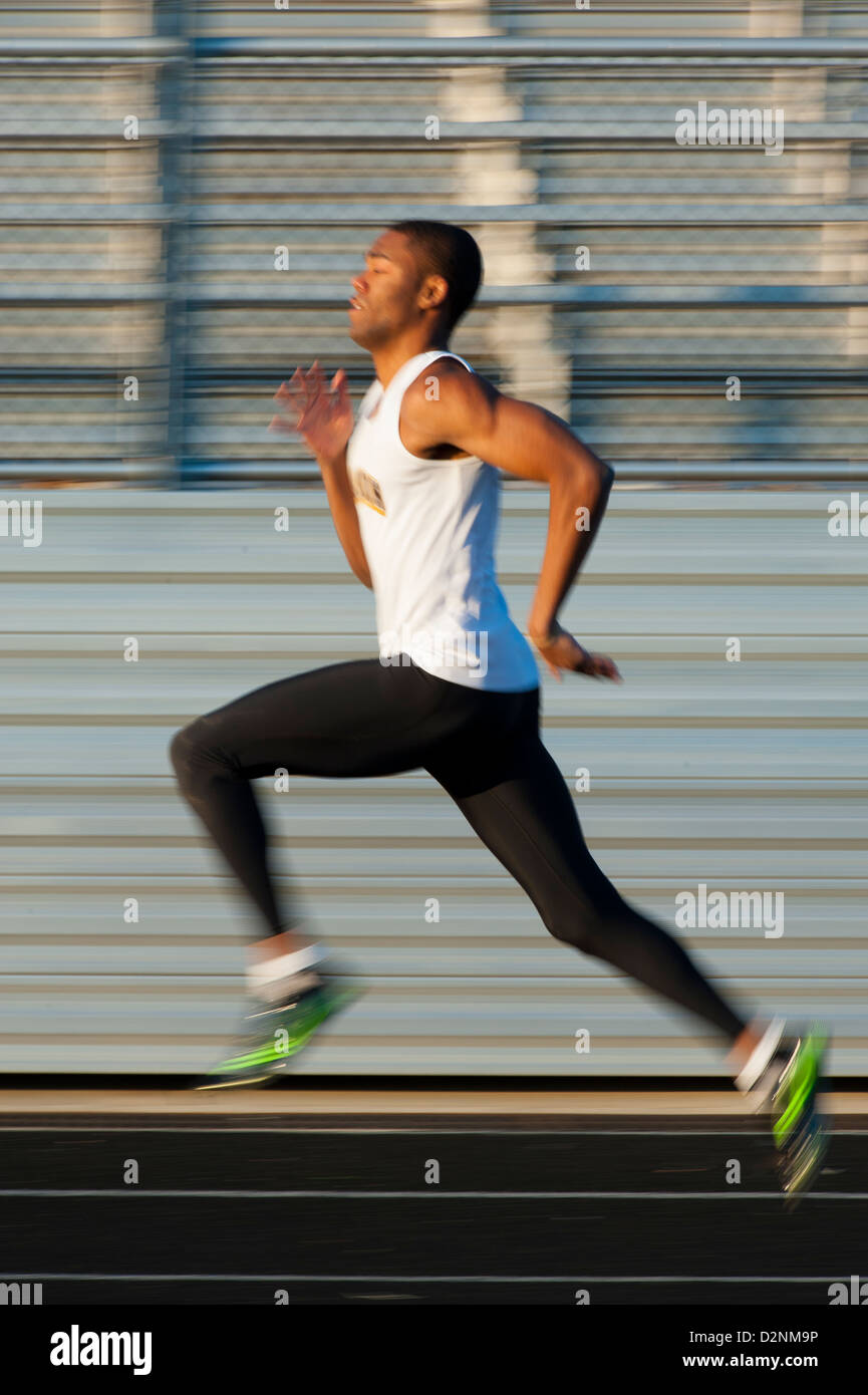 Americano africano nero via runner sprinter in stride Foto Stock