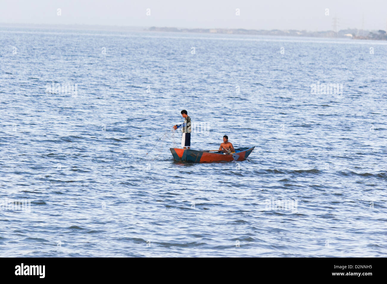 I pescatori su una barca Foto Stock