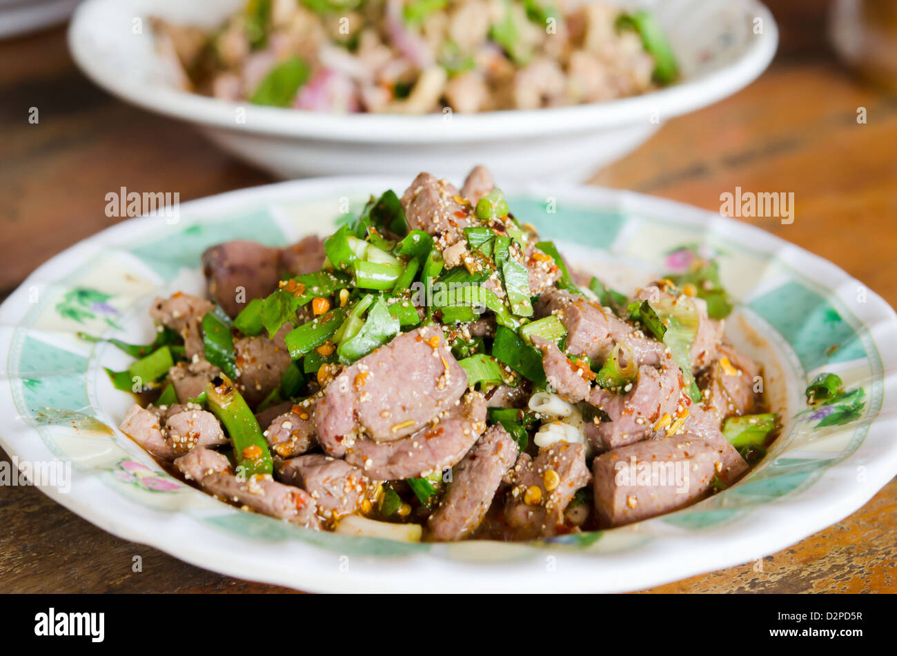 A FETTE piccante insalata di fegato, è un cibo tailandese Foto Stock