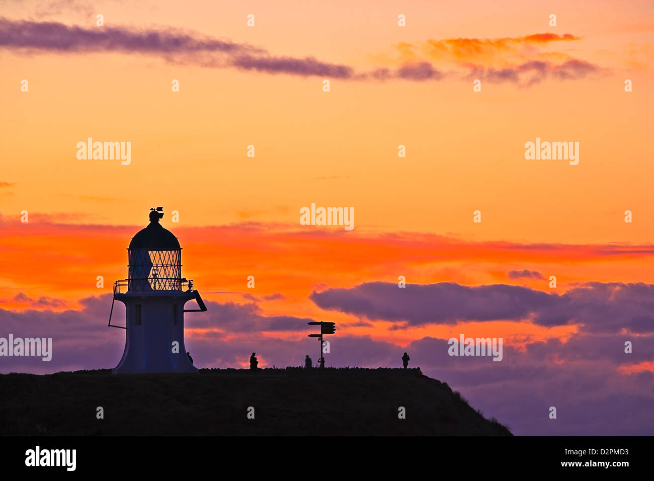 Tramonto a Cape Reinga e Cape Reinga Lighthouse, Northland e North Island, Nuova Zelanda. Foto Stock