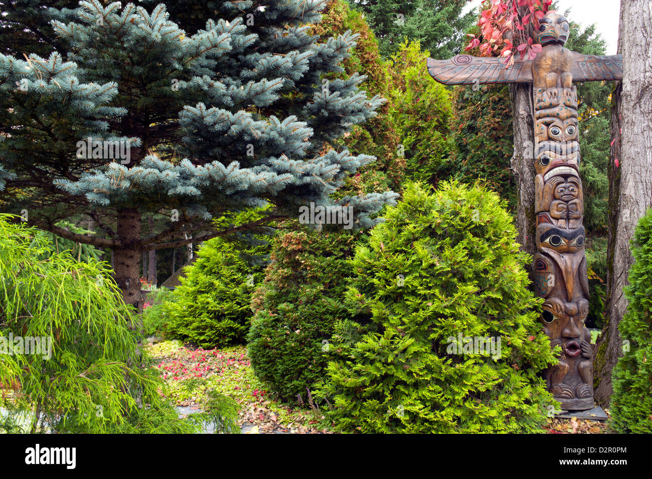 Totem, Giardino a Auclair, Bas Saint-Laurent Regione, Provincia di Quebec, Canada, America del Nord Foto Stock