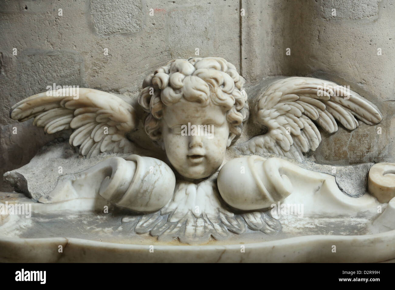 Il XVII secolo l'acqua santa font, St. Germain l'Auxerrois chiesa, Parigi, Francia, Europa Foto Stock