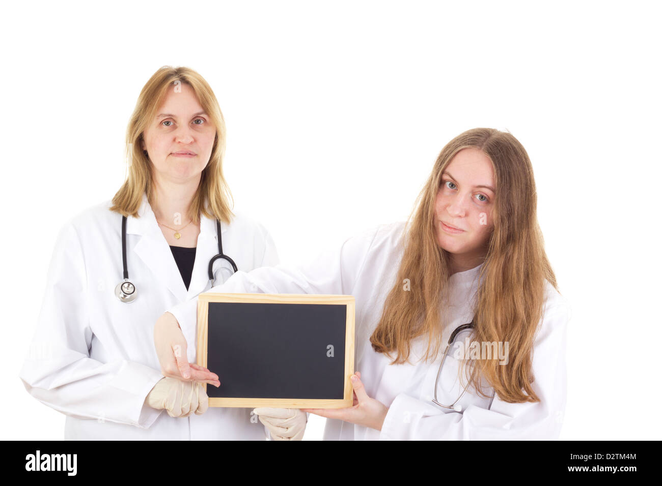 Due femmina medici con Blackboard Foto Stock