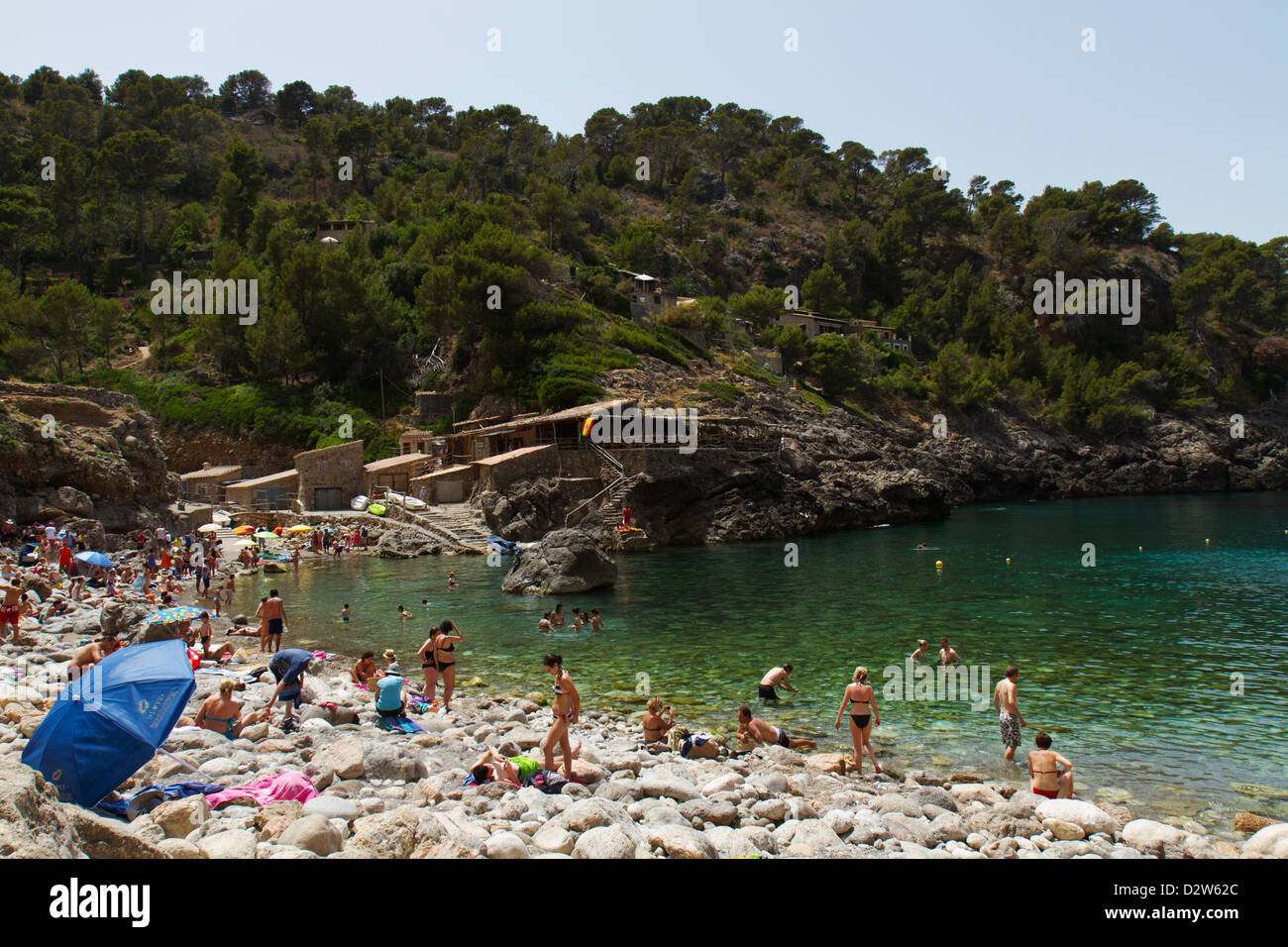 Spiaggia rocciosa di Deya, Maiorca. Foto Stock