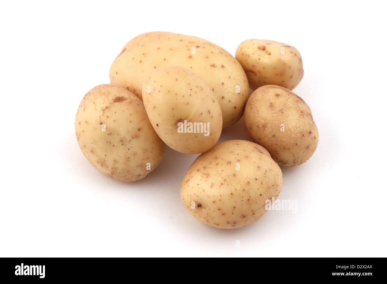 Close up di patate su uno sfondo bianco. Foto Stock