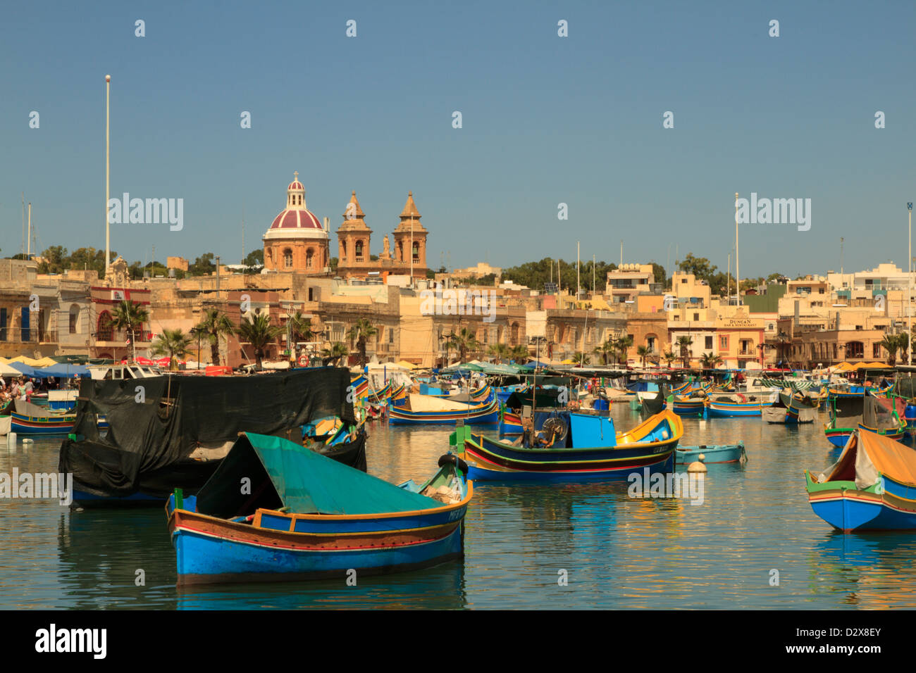 Paesaggio pittoresco foto di Marsaxlokk porto di pescatori, Malta Foto Stock