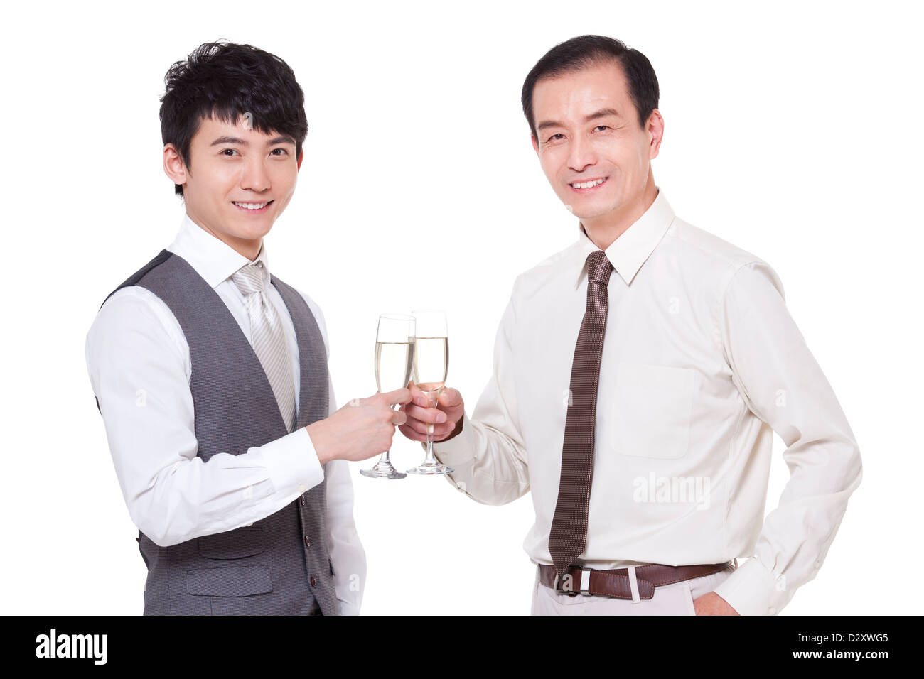 Imprenditori con champagne flutes la tostatura Foto Stock
