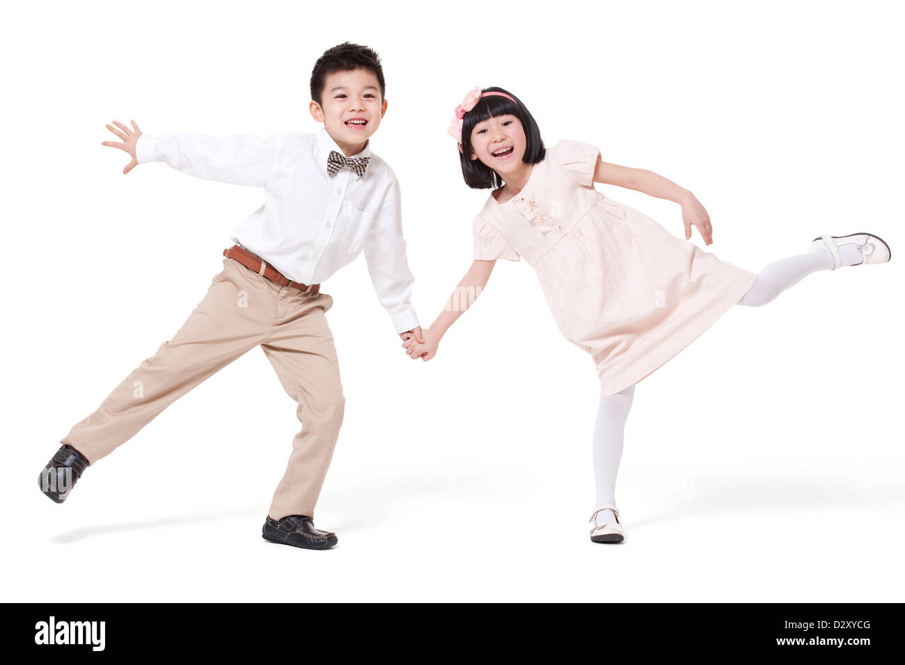 Bel ragazzo e tenendo le mani avendo divertimento Foto Stock
