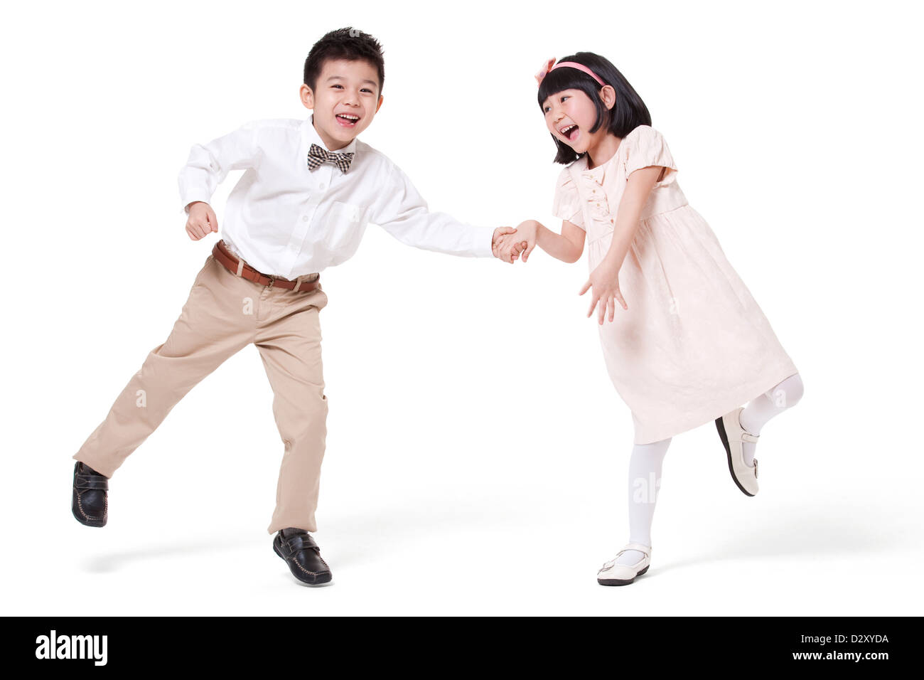 Bel ragazzo e tenendo le mani avendo divertimento Foto Stock