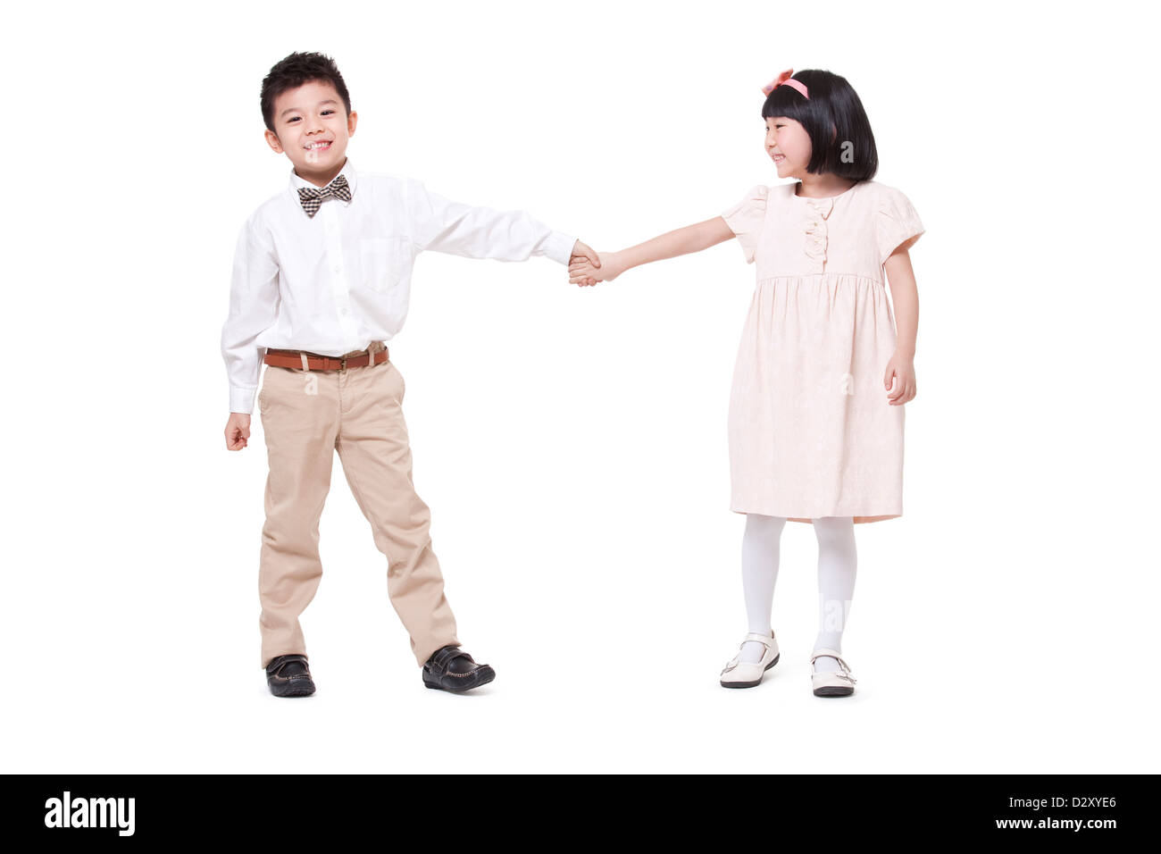 Bel ragazzo e tenendo le mani avendo divertimento Foto Stock