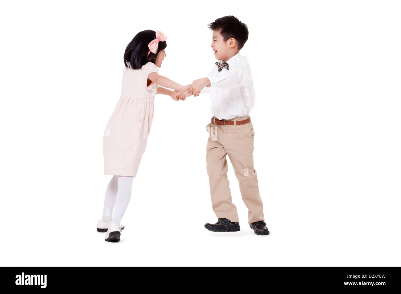 Bel ragazzo e tenendo le mani avendo divertimento Foto Stock