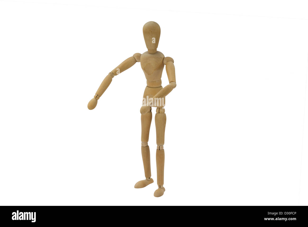 Una femmina di legno bambola è permanente e la presentazione Foto Stock