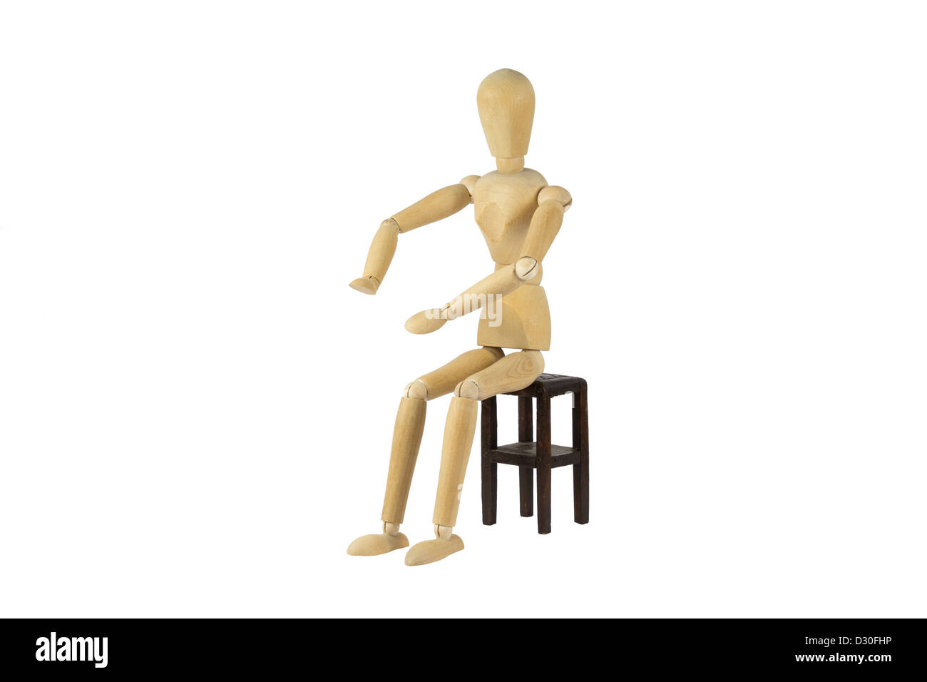 Una femmina di legno bambola è qualcosa di spinta lontano Foto Stock