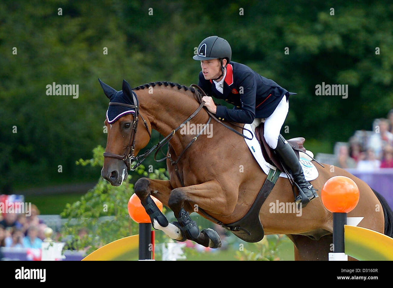 Scott insolente riding Ciao Sanctos (GBR, Gran Bretagna). Showjumping individuali Foto Stock