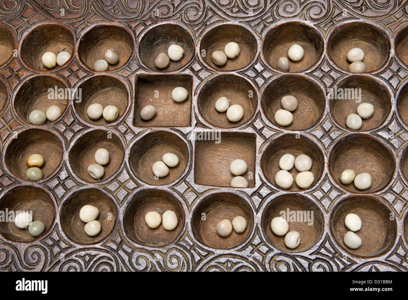 Bao gioco, Lamu, l'arcipelago di Lamu, Kenya Foto Stock