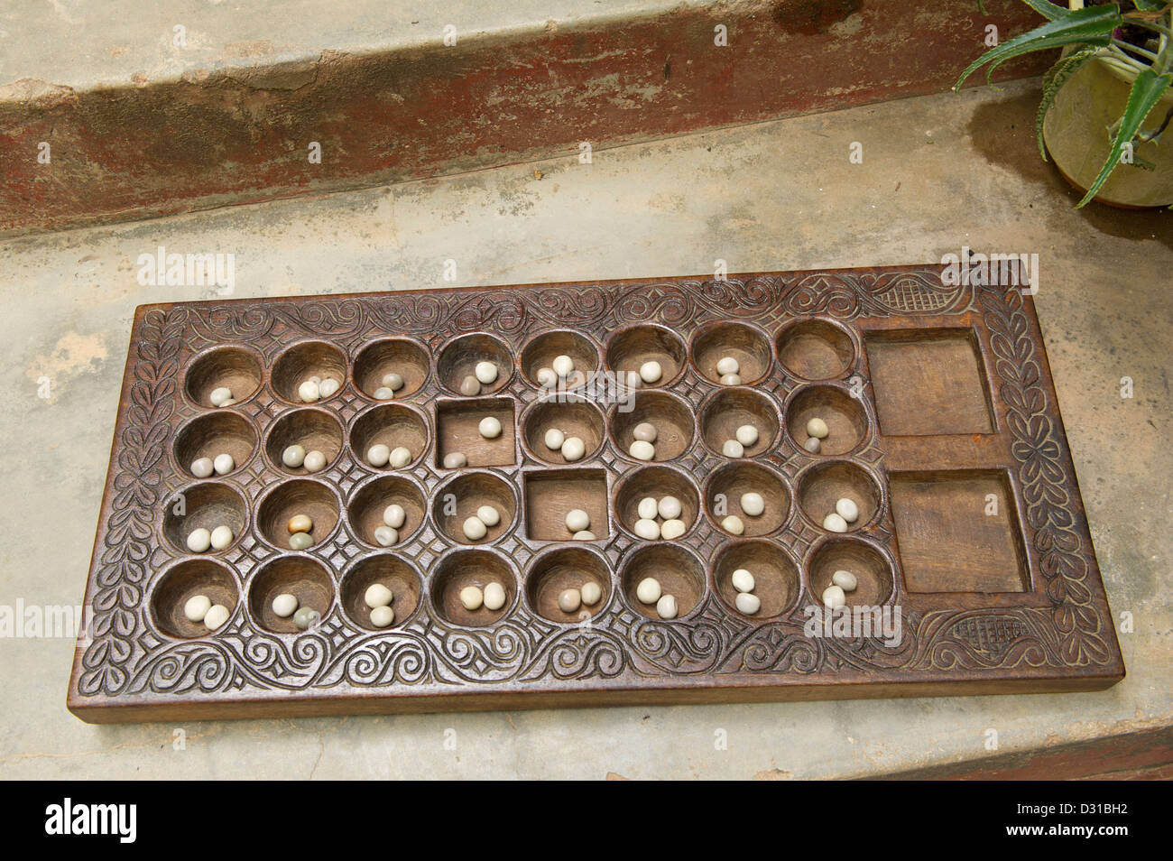Bao gioco, Lamu, l'arcipelago di Lamu, Kenya Foto Stock