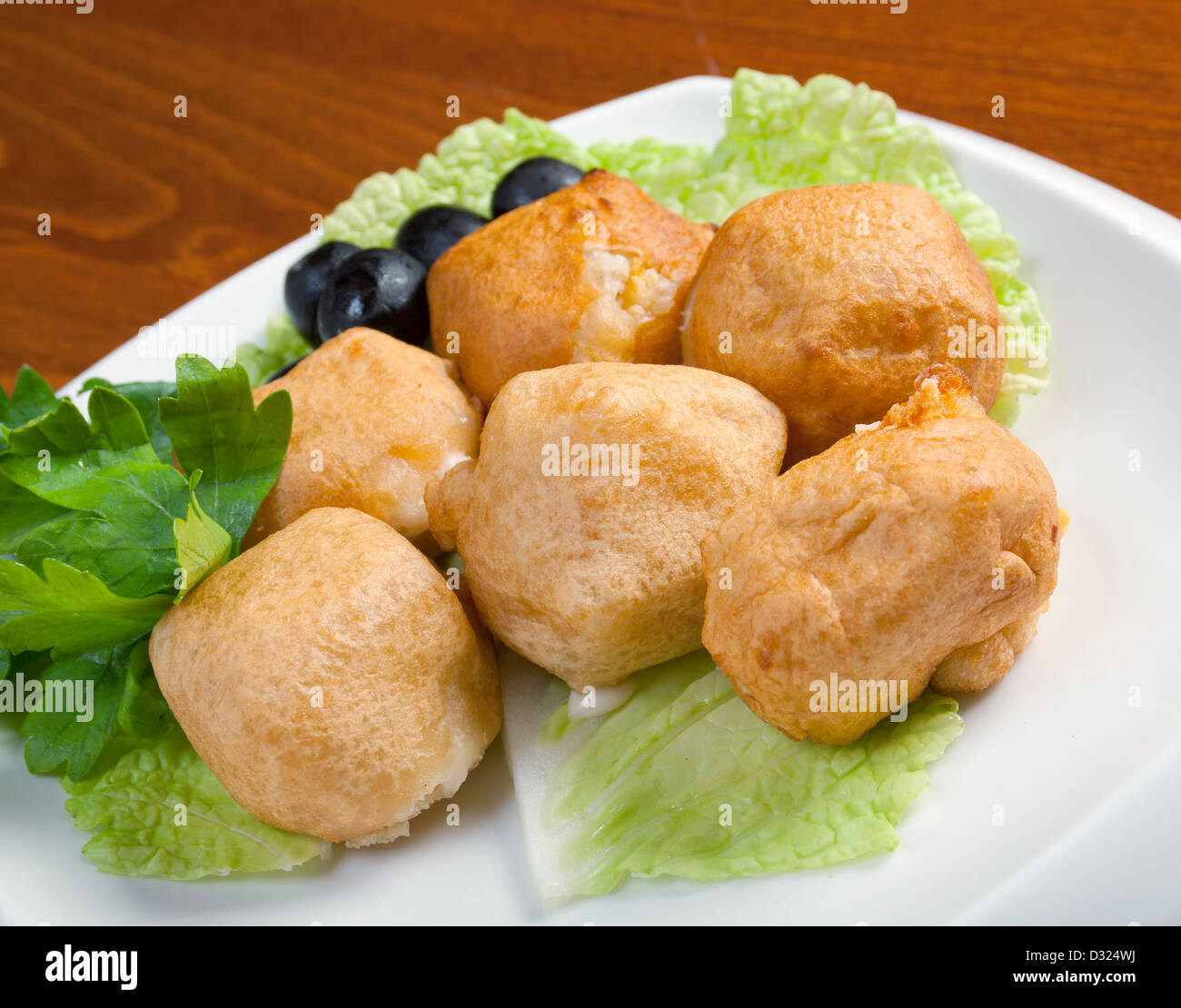 Patate al forno cunei.Cucina italiana Foto Stock