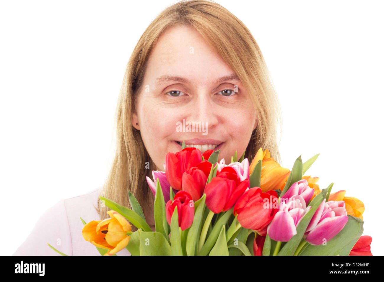 Donna con i tulipani Foto Stock