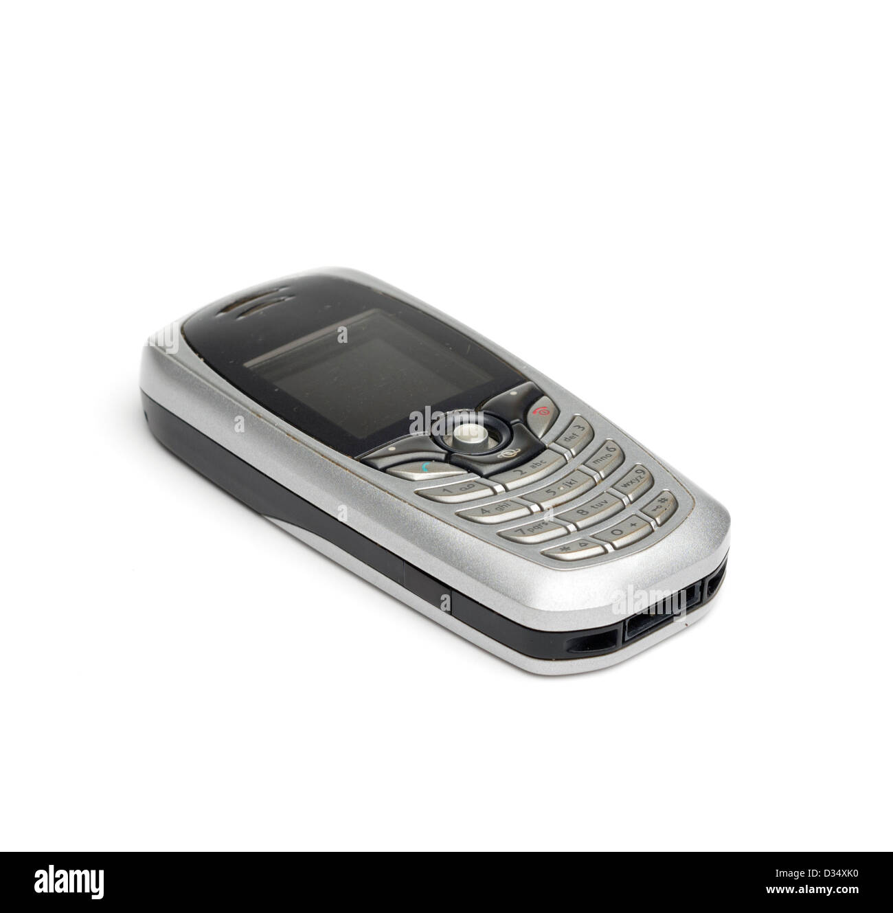 Vecchio telefono cellulare isolato su sfondo bianco Foto Stock