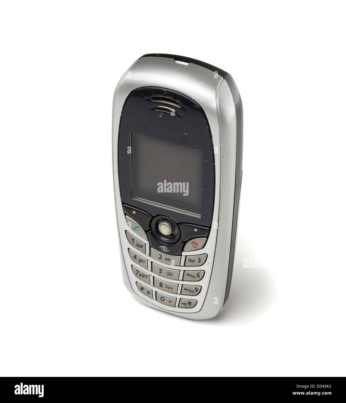 Vecchio telefono cellulare isolato su sfondo bianco Foto Stock