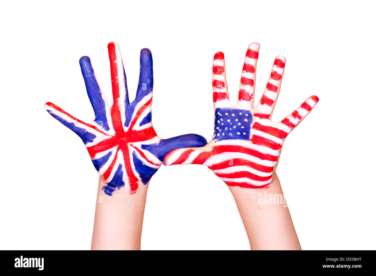 Americani e inglesi bandiere sulle mani. Apprendimento della lingua inglese concept. Foto Stock