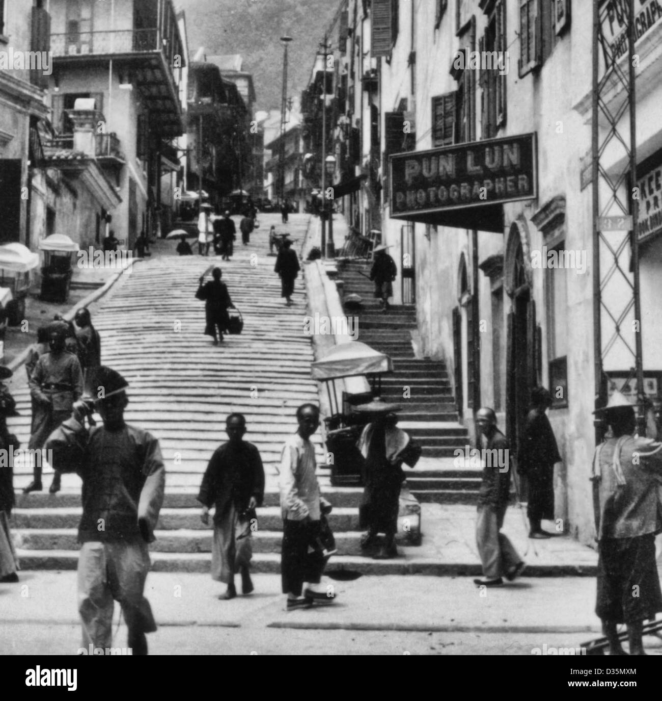 Una strada di Hong Kong, Cina, circa 1901 Foto Stock