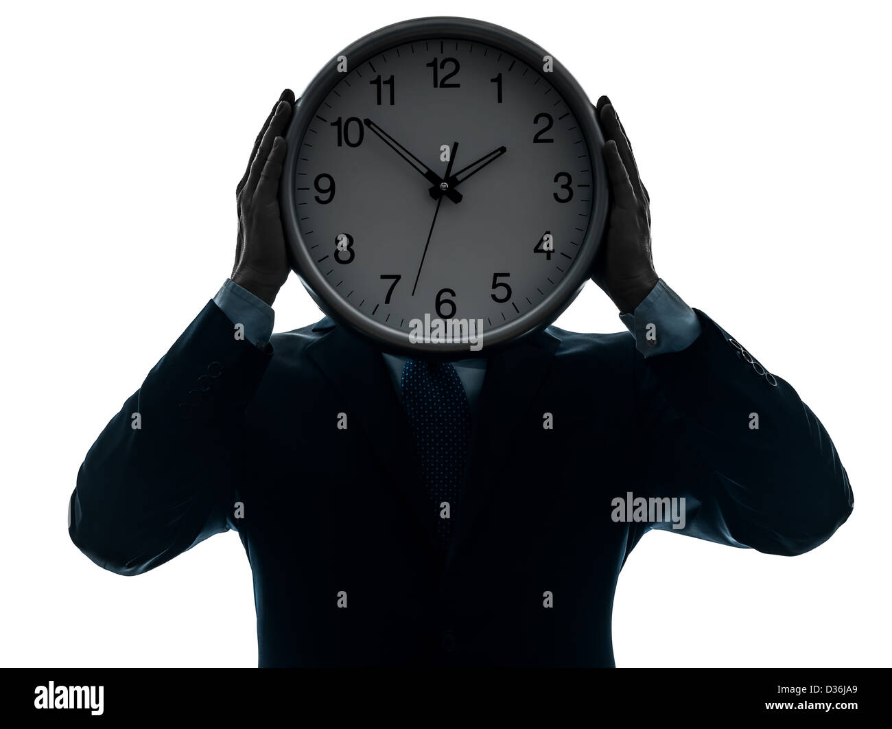 Un imprenditore tenendo premuto clock in silhouette studio isolato su sfondo bianco Foto Stock