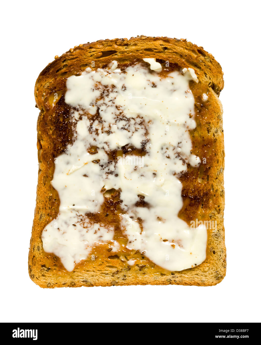 Fetta di pane tostato (marrone, pane integrale), preventivamente imburrato. Foto Stock