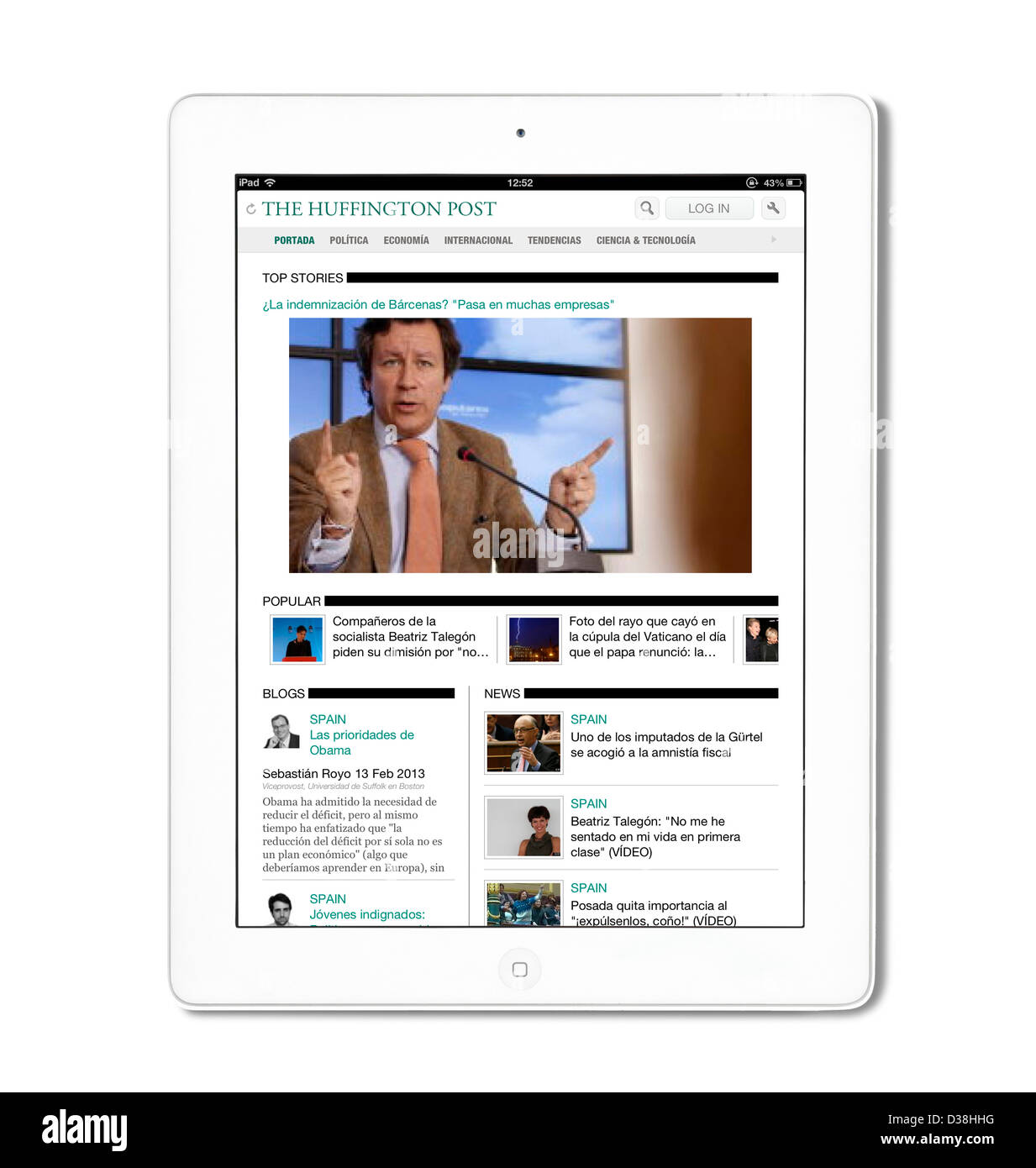 App per iPad che mostra l'edizione spagnola del Huffington Post visualizzati su una quarta generazione di Apple iPad Foto Stock