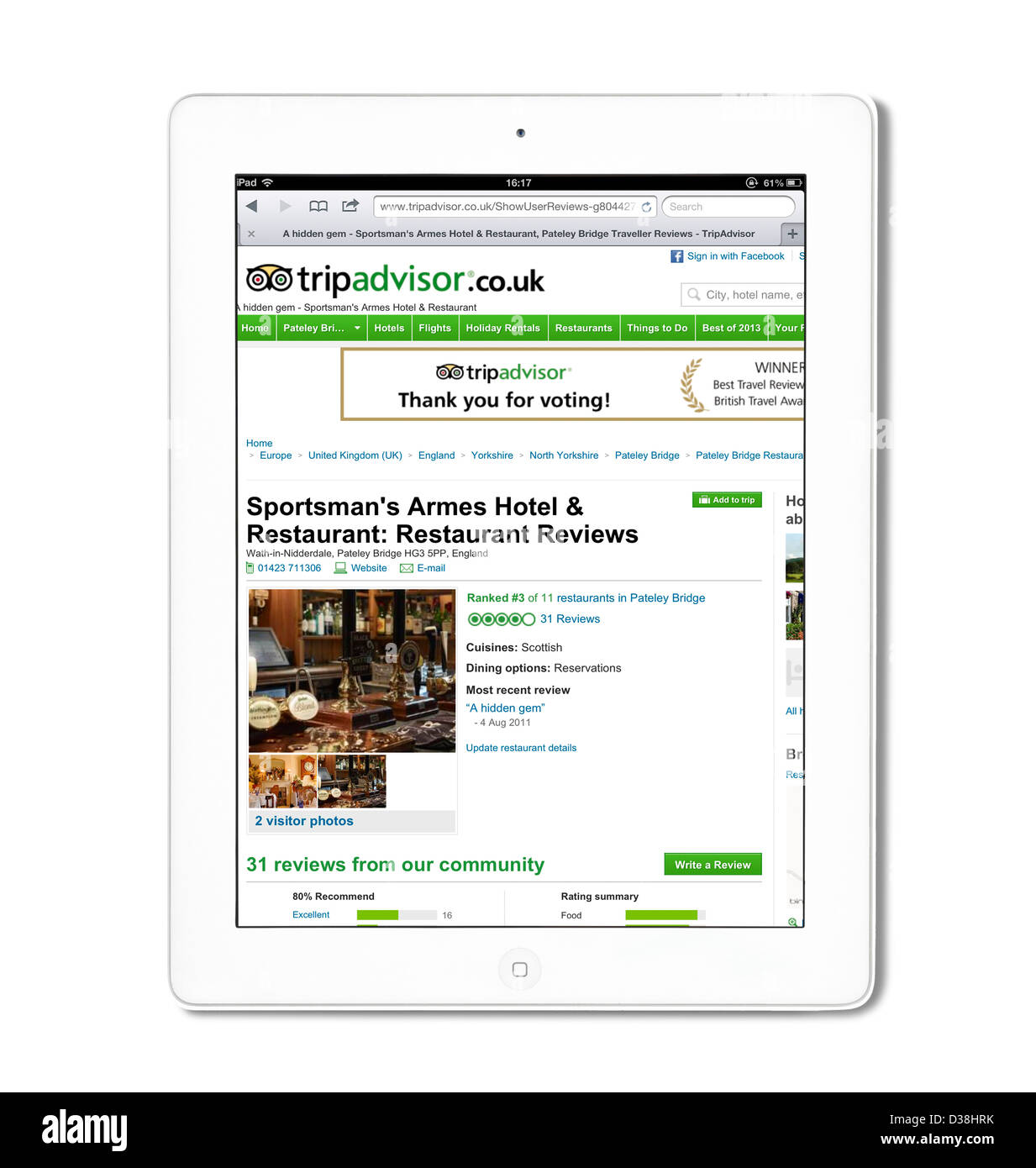 Il TripAdvisor Regno Unito sito web visualizzato su una quarta generazione di Apple iPad Foto Stock