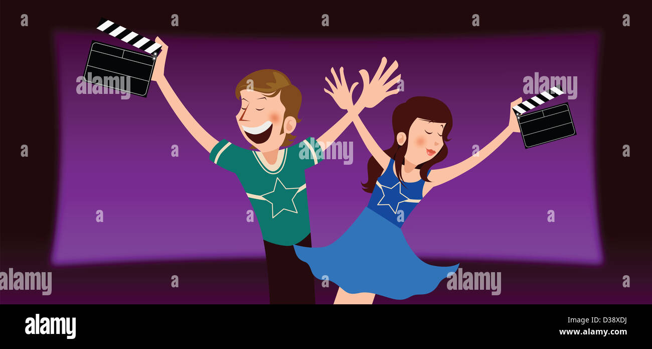 Uomo con una donna holding film ardesie in un cinema Foto Stock